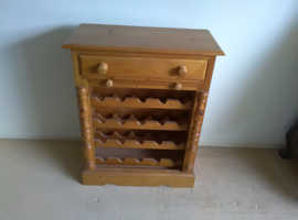 Solid Pine 20 bottle wine rack with pull out serving leaf and a drawer