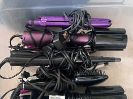 Curling tongs and hair straighteners