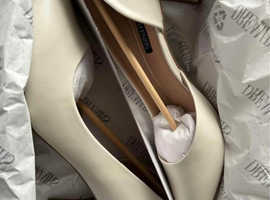White heels New in box size 8