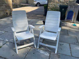 A pair of Hartman Recliner Chairs