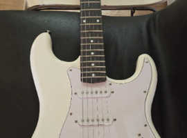 Two electric guitars with amp - accessories