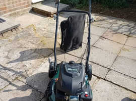 Self propelled lawn mower
