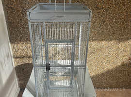 Bird cage with playtop