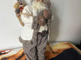 Approximately 2 foot high for father Christmas