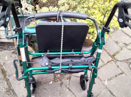 Four wheeled walker.
