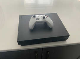 X box one x as new condition with one controller