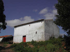 Two old Cottages for sale next to a lake in the Algarve Portugal