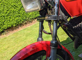 Kawasaki KH 125 in red unfinished project
