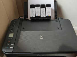 CANNON wireless printerTS3350. with excellent photographic printing (see photo).