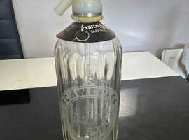 Schweppes soda bottle
