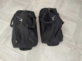 A pair of matching inflight cabin bags