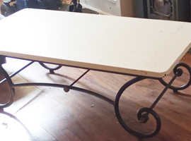 Cast iron and wood coffee table