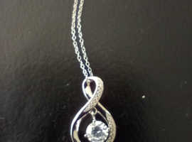 Around 12.50- 1pm I have lost a silver necklace with a silver locket and a silver infinity charm on necklace