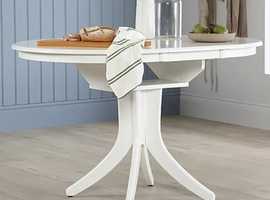 Brand New and Unused, White Round Extending Dining Table.