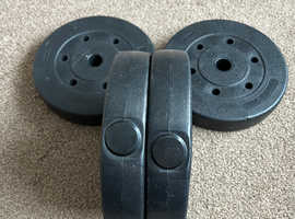 Four 5kg weight plates