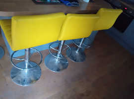 X4 kitchen stools in yellow with backs