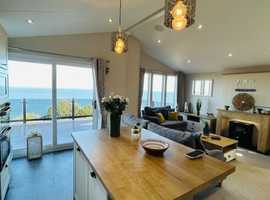 Superb uninterrupted sea views 3 bed lodge, with utility room and 34 years licence!