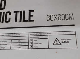 2 unopened boxes of ceramic wall tiles