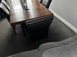 Walnut dining table plus 6 leather chairs