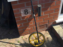 Measuring walking wheel