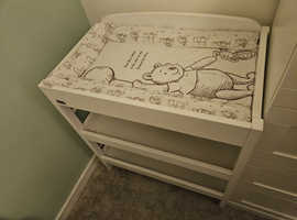 Cot, changing table, play gym and soft toys