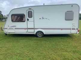 swift lifestyle 5000  2005  fixed bed with motor mover. awnings