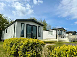 Single lodge for sale on North Wales Coast - sited move in within 7 days
