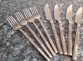 Four knives and forks