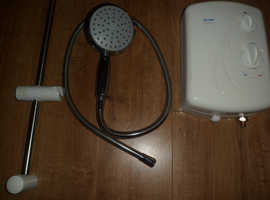 triniton electric shower used but good condition and working well  reson for sale change of bathroom