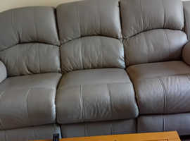 Leather sofa and chair, electric recliners.