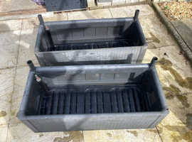 Two very large rattan style anthracite planters.