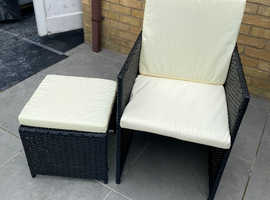 4 Rattan chairs and 4 footstools with cushions
