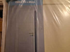 The Wickes Exeter White Smooth Moulded 4 Panel Internal Door