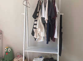 Wooden clothes rail with shelves