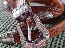 Superbly crafted mens leather belt with metallic studs