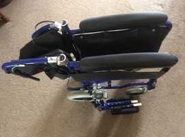 Foldable wheelchair used once and in perfect condition