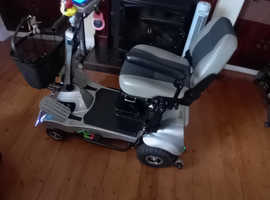Quingo Flyte 4mph scooter with ramps/ docking Station