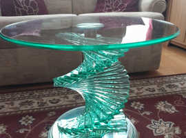 Solid glass side table with a swirled glass base