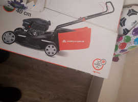 Yardforce petrol mower in box not used