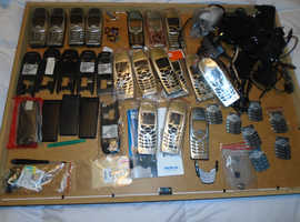 Nokia unlocked 6310i with spares and new parts. batteries, key pads, back and fronts, vibration,