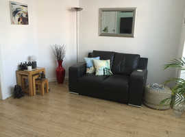 Brown leather sofa,