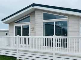 STUNNING PRE-LOVED LODGE ON WINCHELSEA SANDS, 33 YEAR LICENSE, FREE 2025 AND 2026 FEE'S