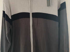 New zipped Jersey size medium still has tags