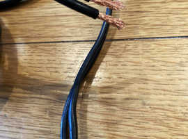 Vintage QED 79 strand copper speaker wire. Two lengths of 9.5m ( around 32 feet each). Total length 19m. One length spliced to make 9.5m length.