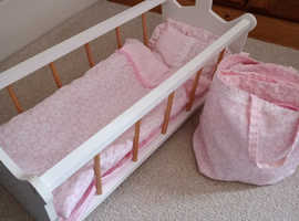 Dolls cot and bedding