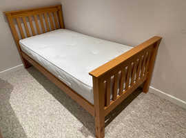 Two Wooden bed frames with mattresses