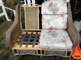 Comfortable large rattan patio sofa and chairs