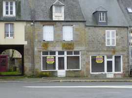 Two shops with living accommodation above in the village center Normandy