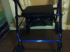 Drive blue 4 wheeled walker with underseat bag