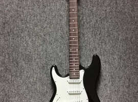 Cheetah left handed lead guitar + amp, other accessories & tutorial DVD/book